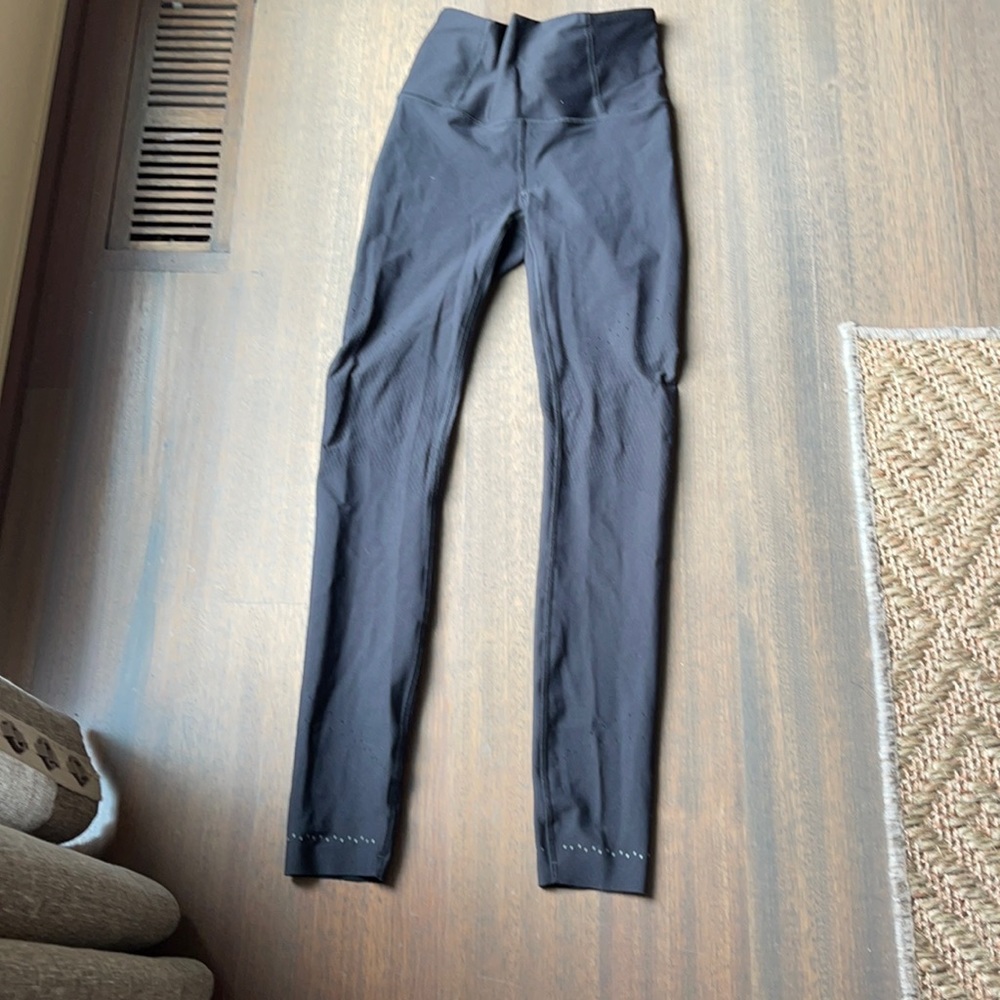 Lululemon black leggings, size 4.